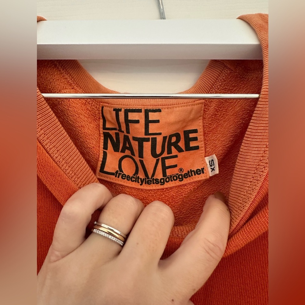 Free city orange pullover
